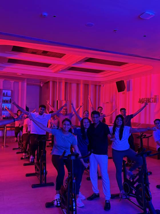 The group after an Immersive Spinning session, in red light