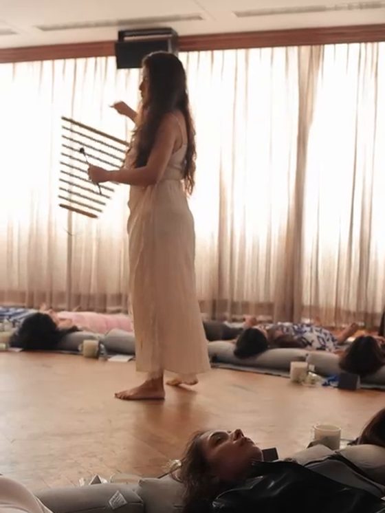 The sound healer with chimes by the window, Forevermark by De Beers morning at Soho House Mumbai